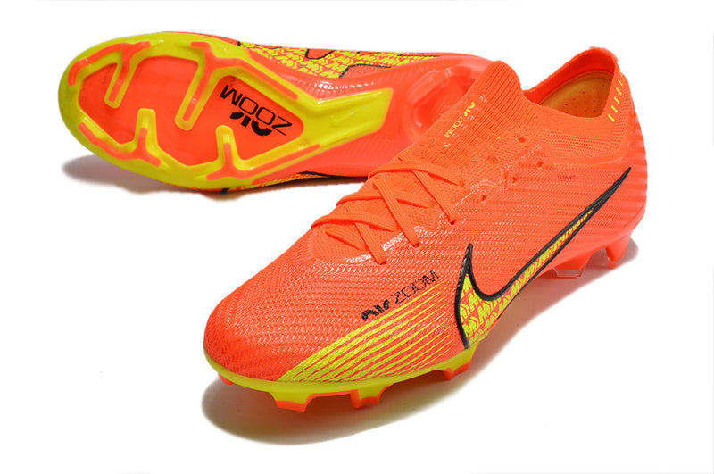 CHUTEIRA NIKE MERCURIAL VAPOR 15 ELITE CAMPO+BRINDE