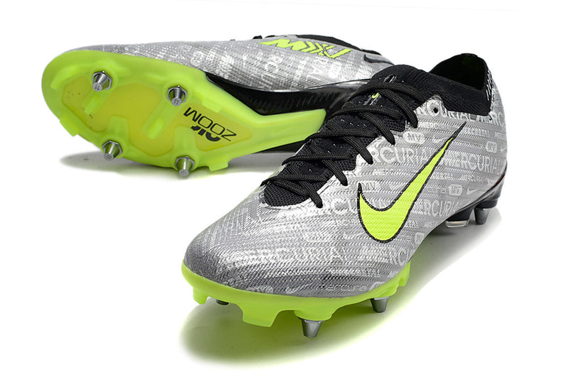 CHUTEIRA NIKE MERCURIAL VAPOR 15 ELITE TRAVA DE ALUMINIO CAMPO+BRINDE