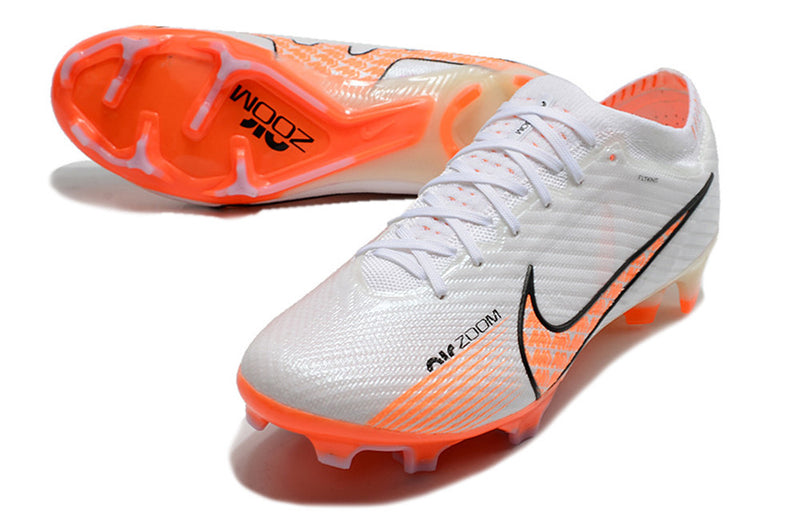 CHUTEIRA NIKE MERCURIAL VAPOR 15 ELITE CAMPO+BRINDE