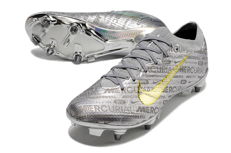 CHUTEIRA NIKE MERCURIAL VAPOR 15 ELITE TRAVA DE ALUMINIO CAMPO+BRINDE