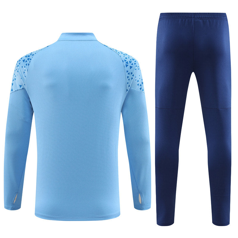 KIT CONJUNTO MEIO ZIPER MANCHESTER CITY 23/24